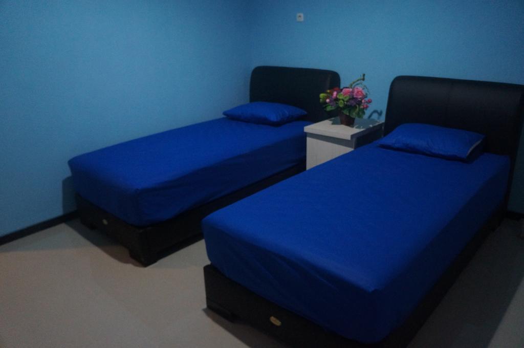 Budget Guest House Tunas Mandiri Jaya Malang Szoba fotó