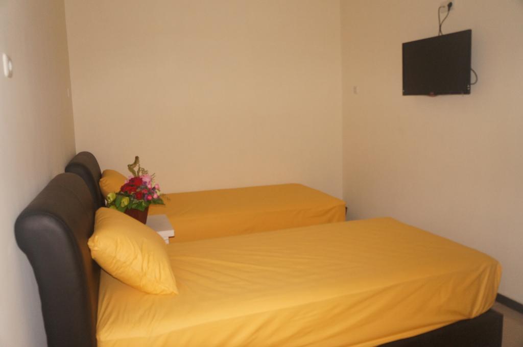 Budget Guest House Tunas Mandiri Jaya Malang Szoba fotó